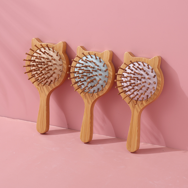 Custom Logo Natural Bamboo Paddle Air Cushion Hairbrush Detangling Massage Travel bamboo hair brush combs supplier factory oem